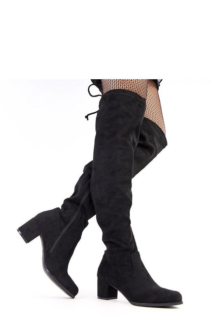 Solea elegant over-the-knee suede boots showcasing a 6 cm heel and sleek design, perfect for stylish winter outfits.