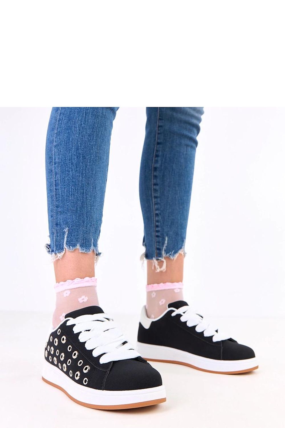 Elegant women's Solea sport shoes made from eco-friendly suede leather, featuring a modern lace-up design and decorative studs, perfect for upscale casual wear.