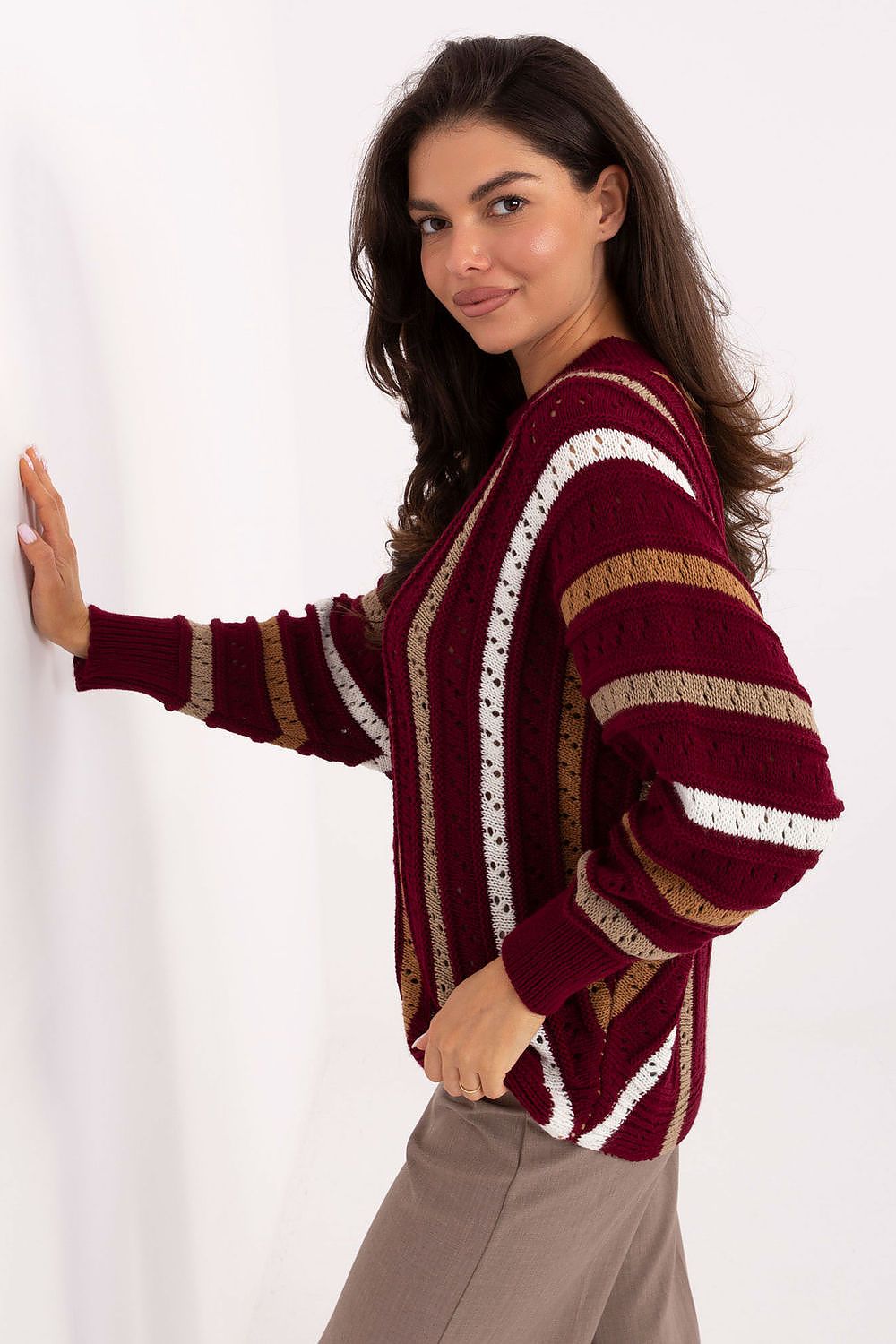 Elegant oversized women's acrylic sweater from Factory Price featuring a chic openwork pattern, perfect for casual wear in cooler days.