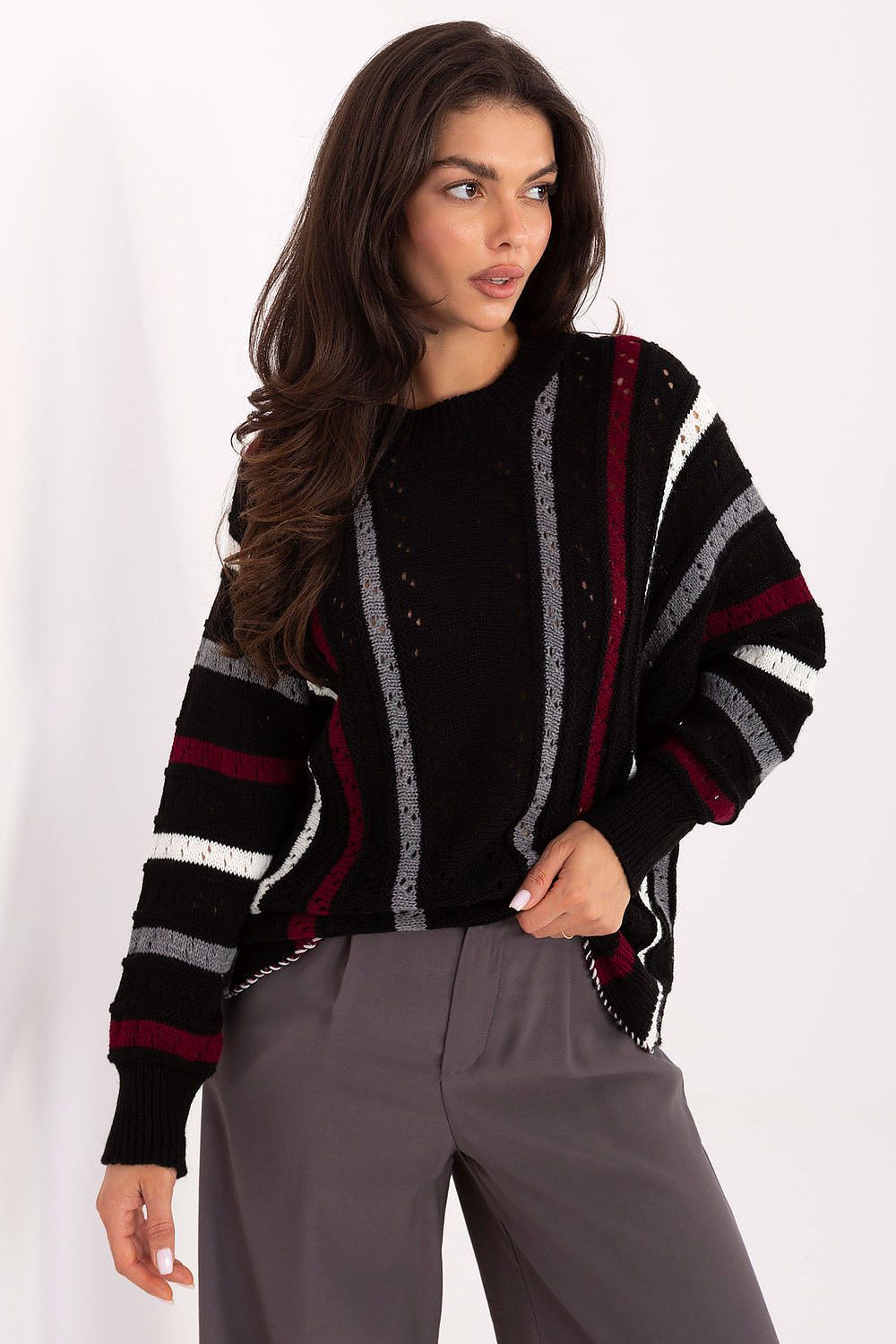Stylish acrylic oversized sweater for women from Factory Price showcasing intricate stripes and a breathable openwork pattern.