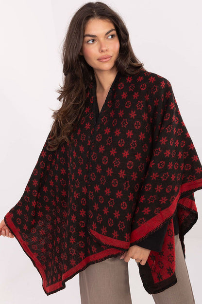 Elegant 100% acrylic poncho from Factory Price featuring a unique print and a loose fit, ideal for sophisticated layering.