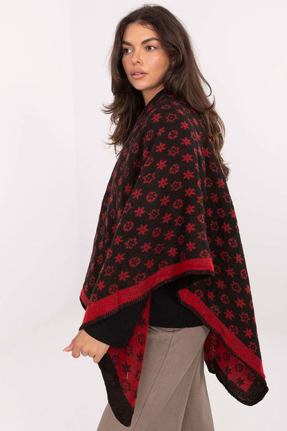 Luxurious poncho in 100% acrylic by Factory Price, showcasing an artistic print and generous dimensions for stylish comfort.