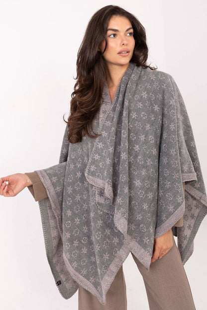 Stylish 100% acrylic poncho designed by Factory Price, showcasing an eye-catching print, perfect for adding sophistication to any outfit.