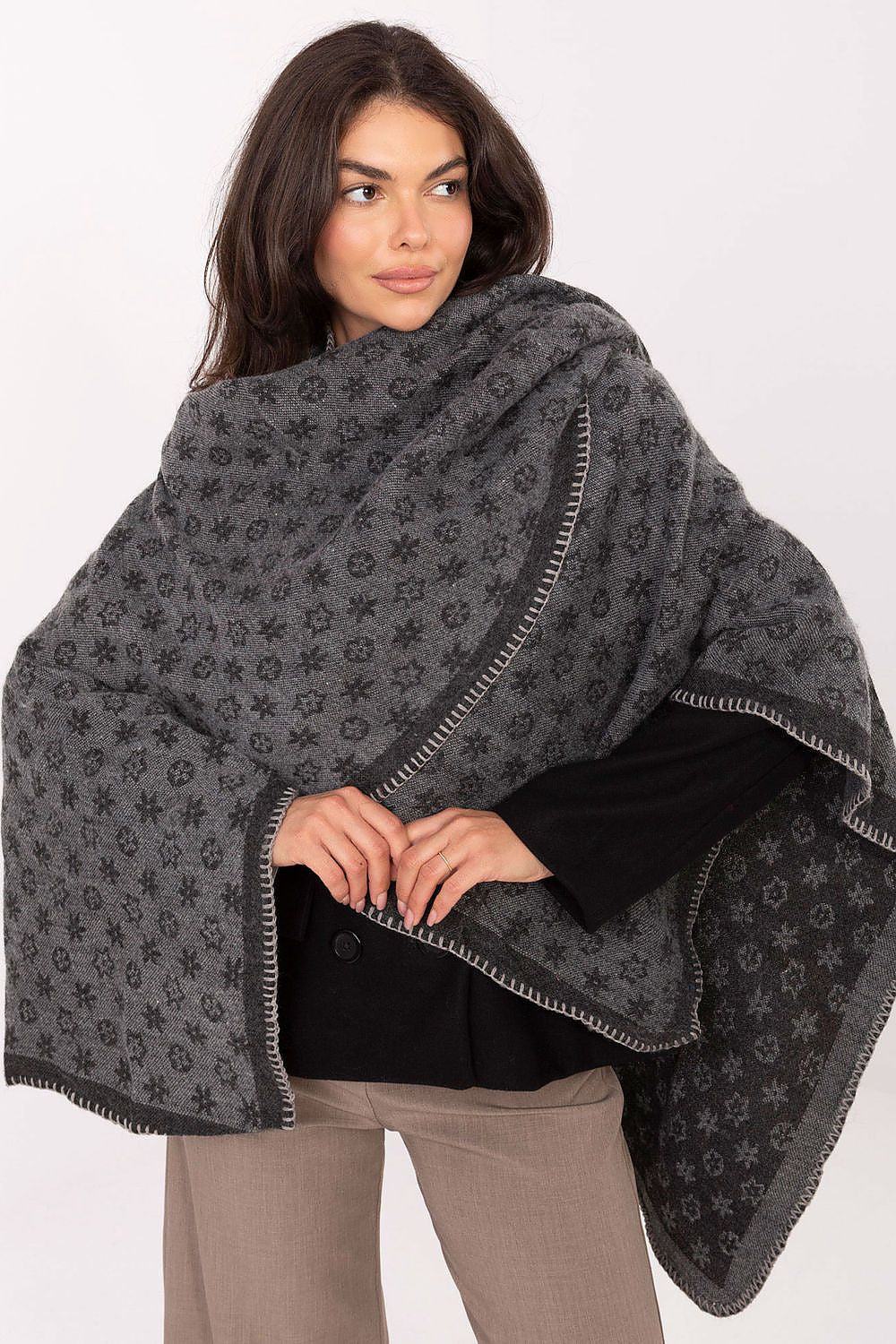 Unique printed poncho in 100% acrylic by Factory Price, blending comfort with style, featuring dimensions of 105cm length and 138cm width.