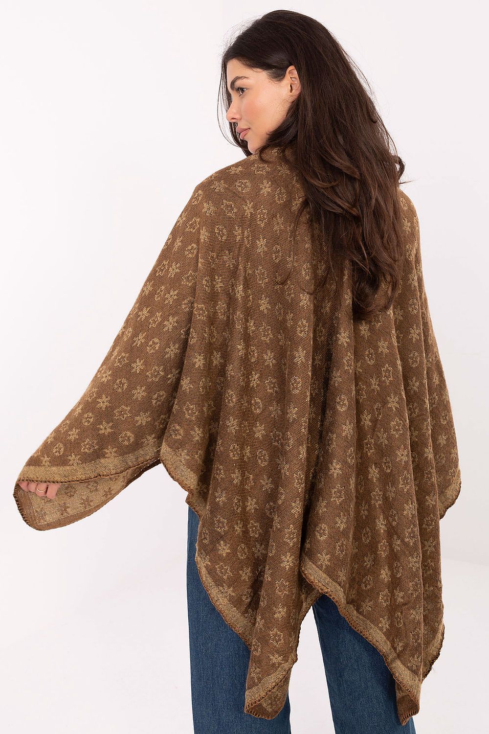 Luxurious 100% Acrylic Poncho from Factory Price, offering a unique design and effortless style for the modern woman's wardrobe.
