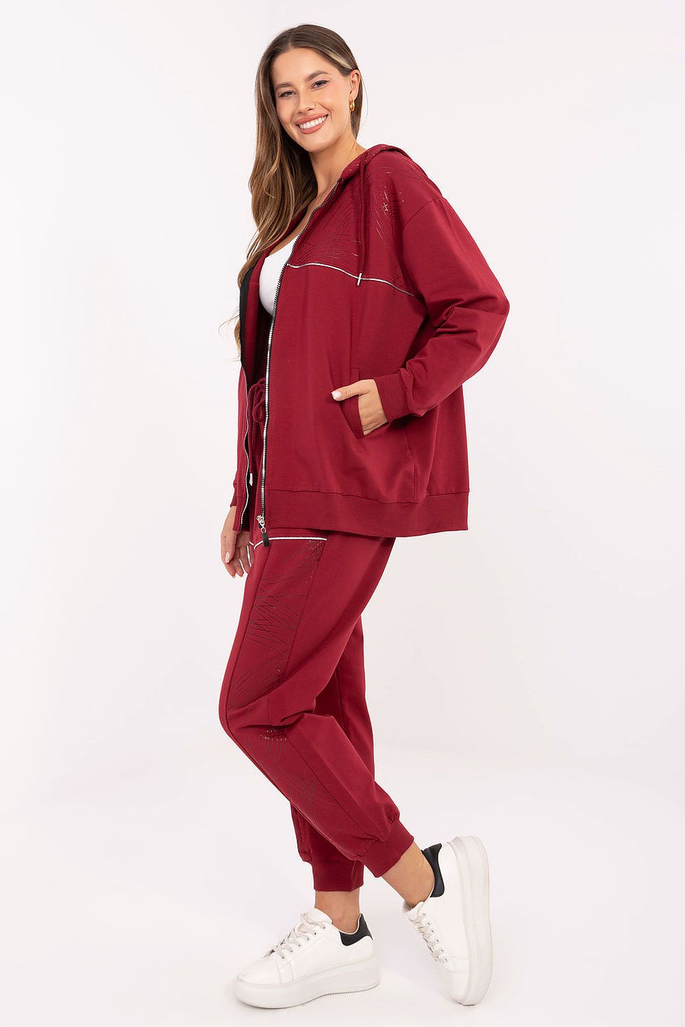 Elegant cotton and spandex tracksuit set for women by Relevance, with functional pockets and a flattering high waist design.
