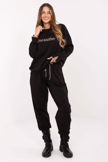 Elegant women's cotton casual tracksuit set by Relevance featuring a stylish embroidered long-sleeved sweatshirt and high-waisted pants, perfect for luxurious comfort.
