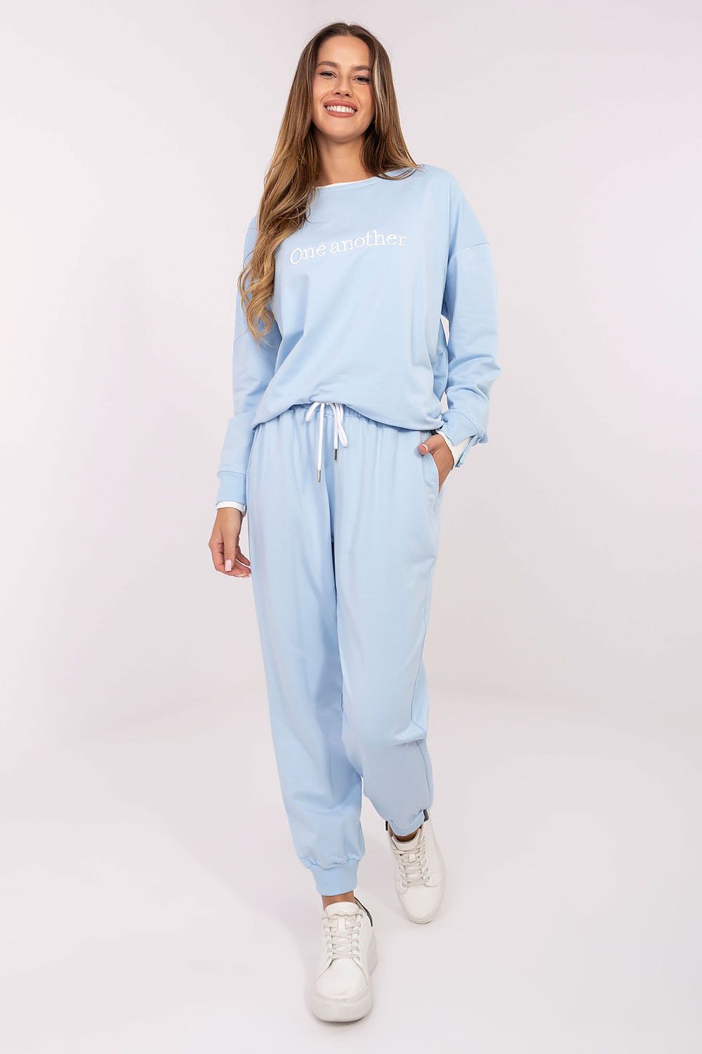 Fashionable high-waisted pants from Relevance's women's cotton casual tracksuit set, highlighting practical side pockets and a comfortable fit for a luxe lifestyle.