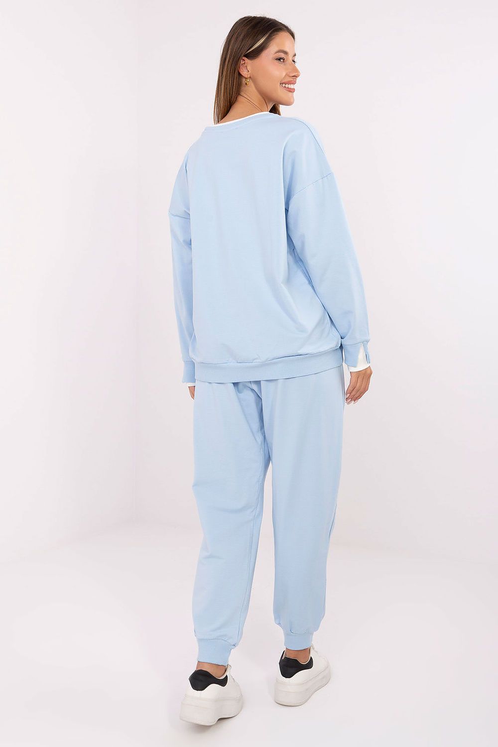 Elegant high-waisted pants from Relevance women's cotton tracksuit, featuring side slip pockets and cuffed hems.