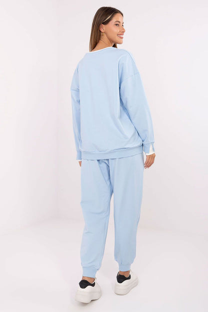 Elegant high-waisted pants from Relevance women's cotton tracksuit, featuring side slip pockets and cuffed hems.