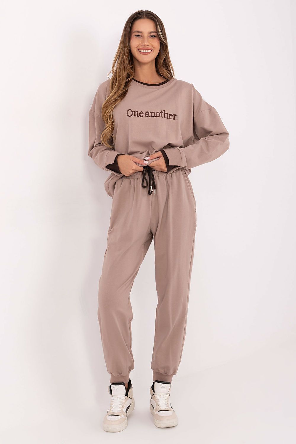 Relevance women's casual tracksuit set model displaying modern comfort and high-fashion style, perfect for daily wear.