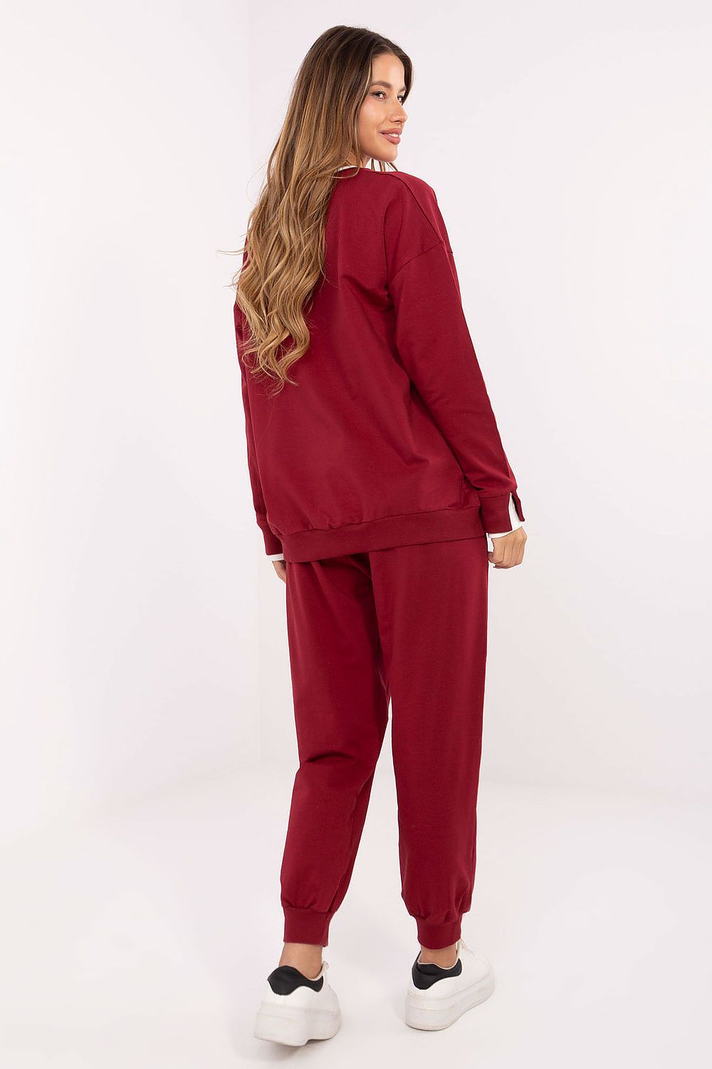 Elegant high-waisted pants with cuffs and side pockets from Relevance's women's cotton casual tracksuit set, perfect for comfort and practicality.