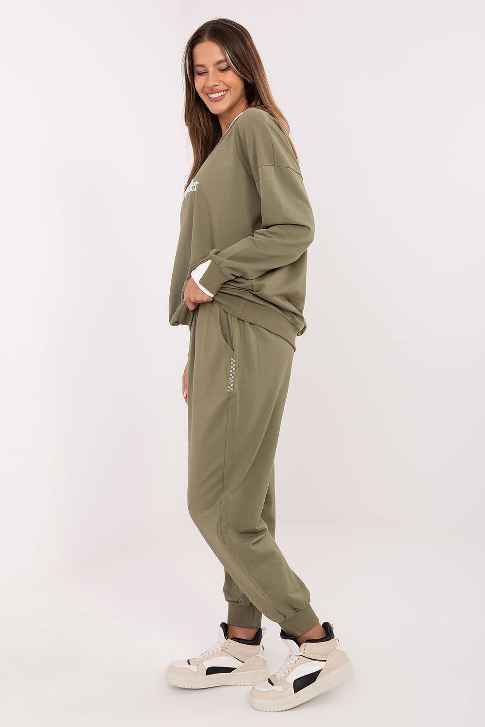 Complete look of Relevance's women's casual tracksuit set, combining elegance and functionality for a stylish and comfortable outfit for any occasion.