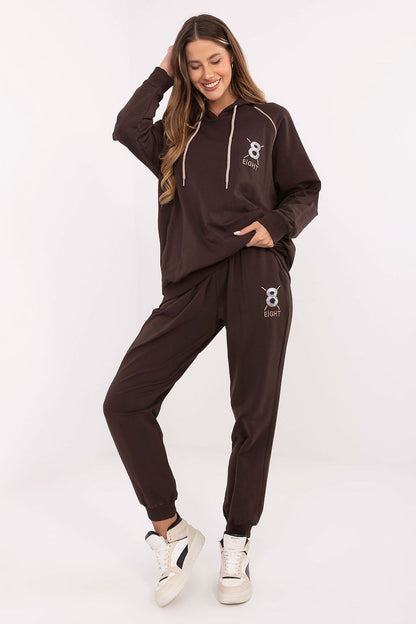 Elegant women's casual tracksuit set featuring an embellished hoodie and high-waisted pants, perfect for stylish everyday wear by Relevance.