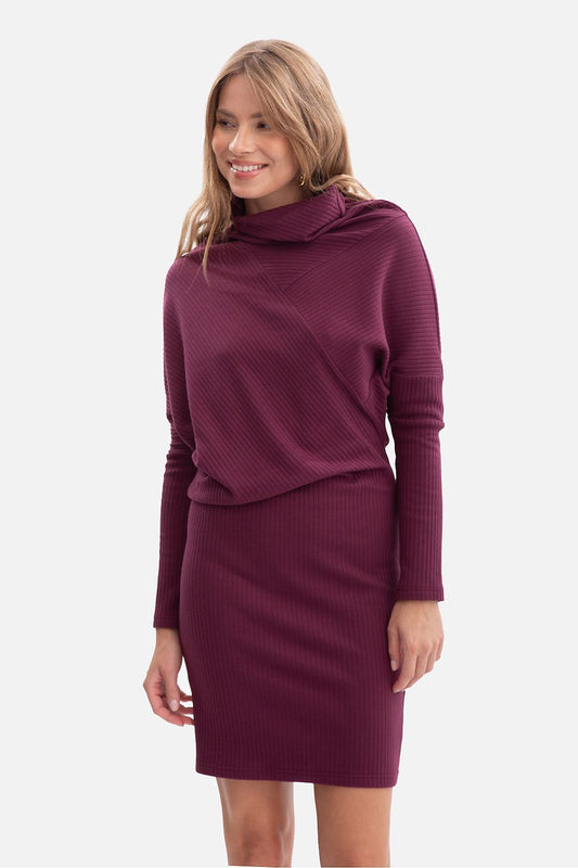 Elegant BeWear Mini Ribbed Daydress featuring a high stand-up collar, showcasing its luxurious ribbed fabric and batwing sleeves, perfect for sophisticated women's fashion.