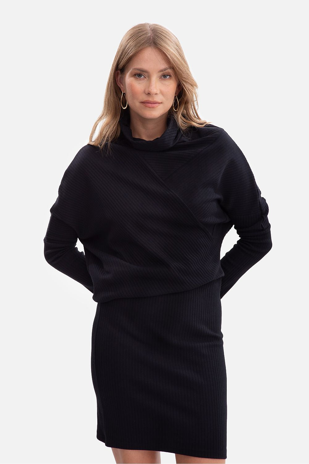 Stylish BeWear Mini Ribbed Daydress in S/M and L/XL sizes, featuring a fitted pencil bottom and sophisticated design accentuating femininity.