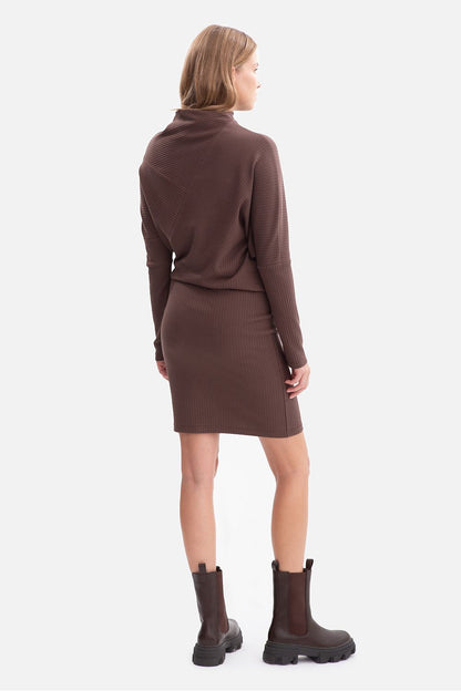 Full view of BeWear Mini Ribbed Daydress in a stylish setting, demonstrating its elegant batwing sleeves and fitted pencil bottom, an ideal choice for fashionable women.