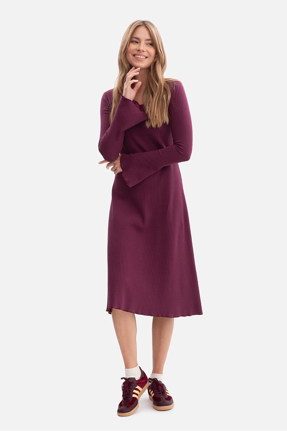 Elegant feminine midi daydress by BeWear in ribbed fabric, showcasing a classic round neckline and flared long sleeves, perfect for effortless chic sophistication.