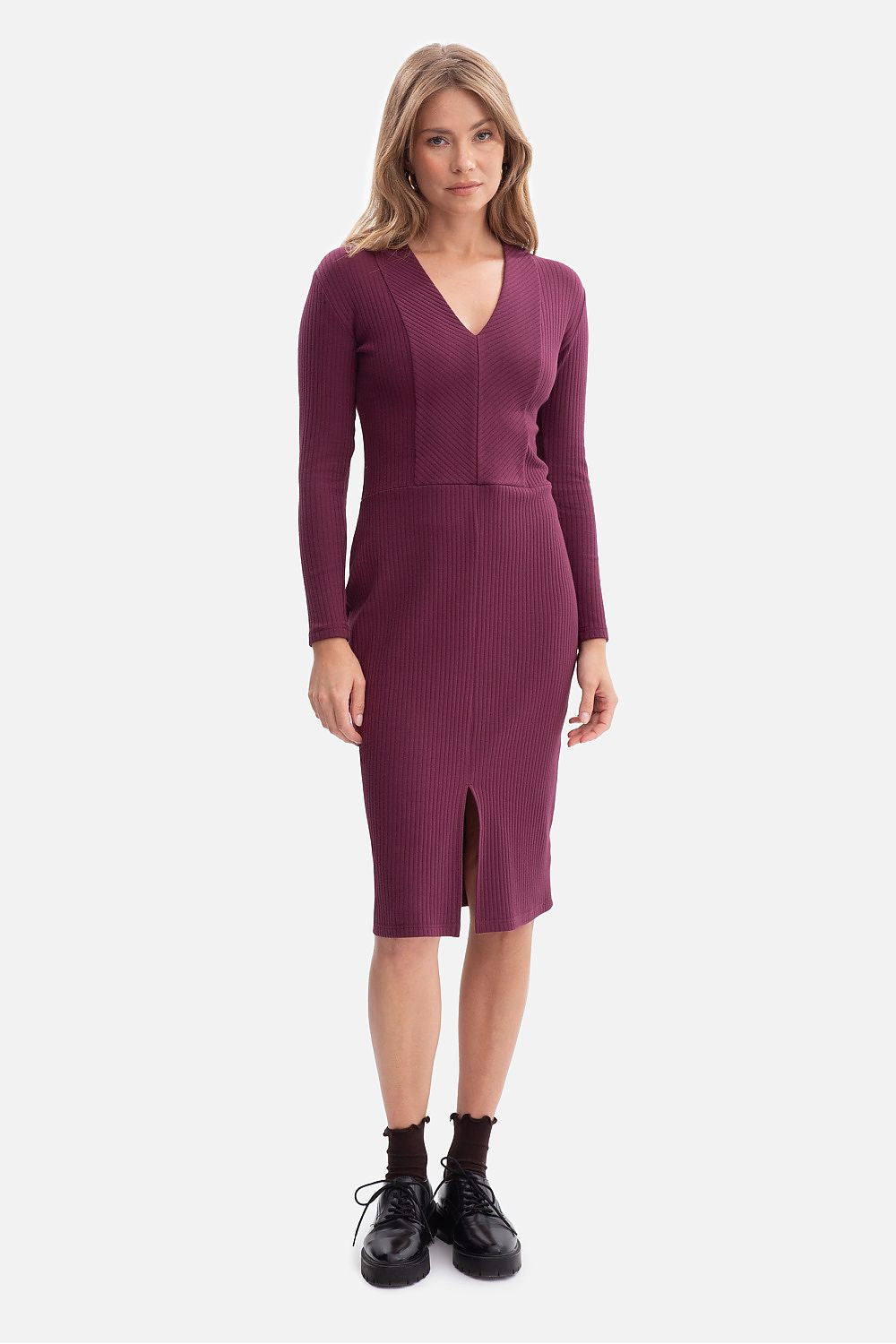 Elegant midi daydress by BeWear, featuring ribbed fabric, a flattering V-neck, and fitted style, perfect for sophisticated occasions. Available in sizes S to L, designed in Poland for timeless chic.