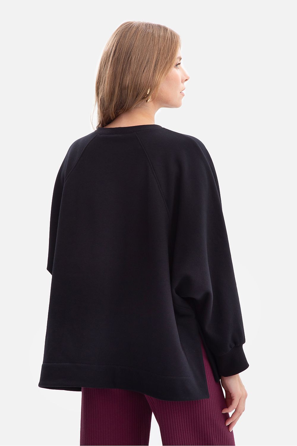 Close-up view of BeWear women's sweatshirt showcasing the soft texture and ribbed neckline, ideal for everyday elegance while maintaining a sporty aesthetic.
