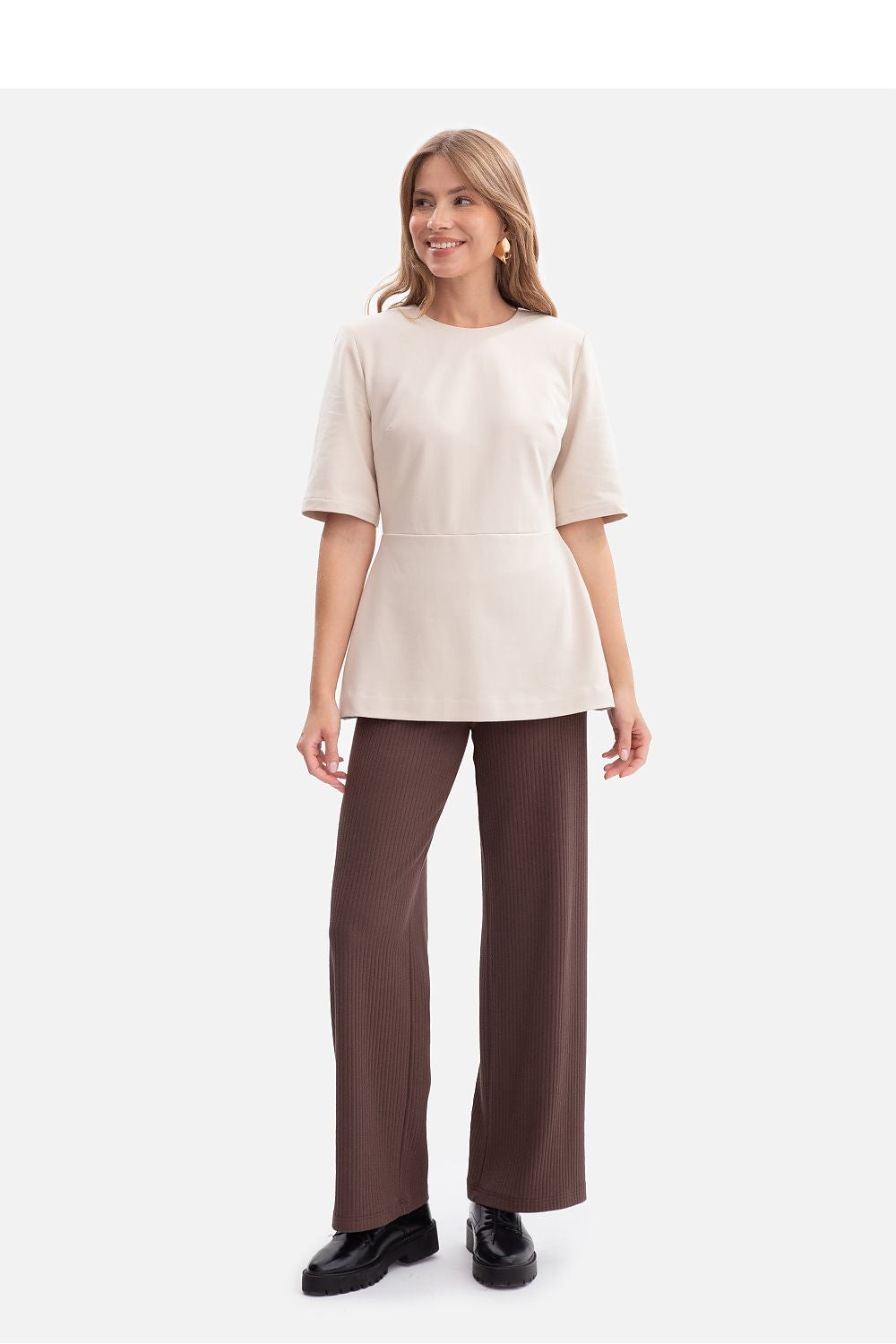 Close-up of the back view of the BeWear blouse with concealed zipper, showcasing exquisite detailing and refined design.