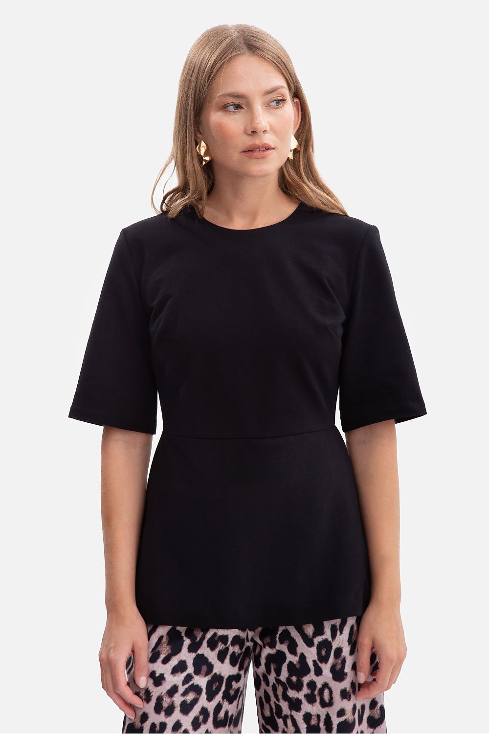 Close-up view of the BeWear blouse showcasing the exquisite fabric texture and elegant design details.