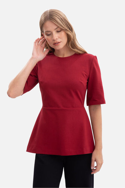 Full view of the BeWear blouse in an elegant setting, demonstrating timeless style and versatility for various occasions.