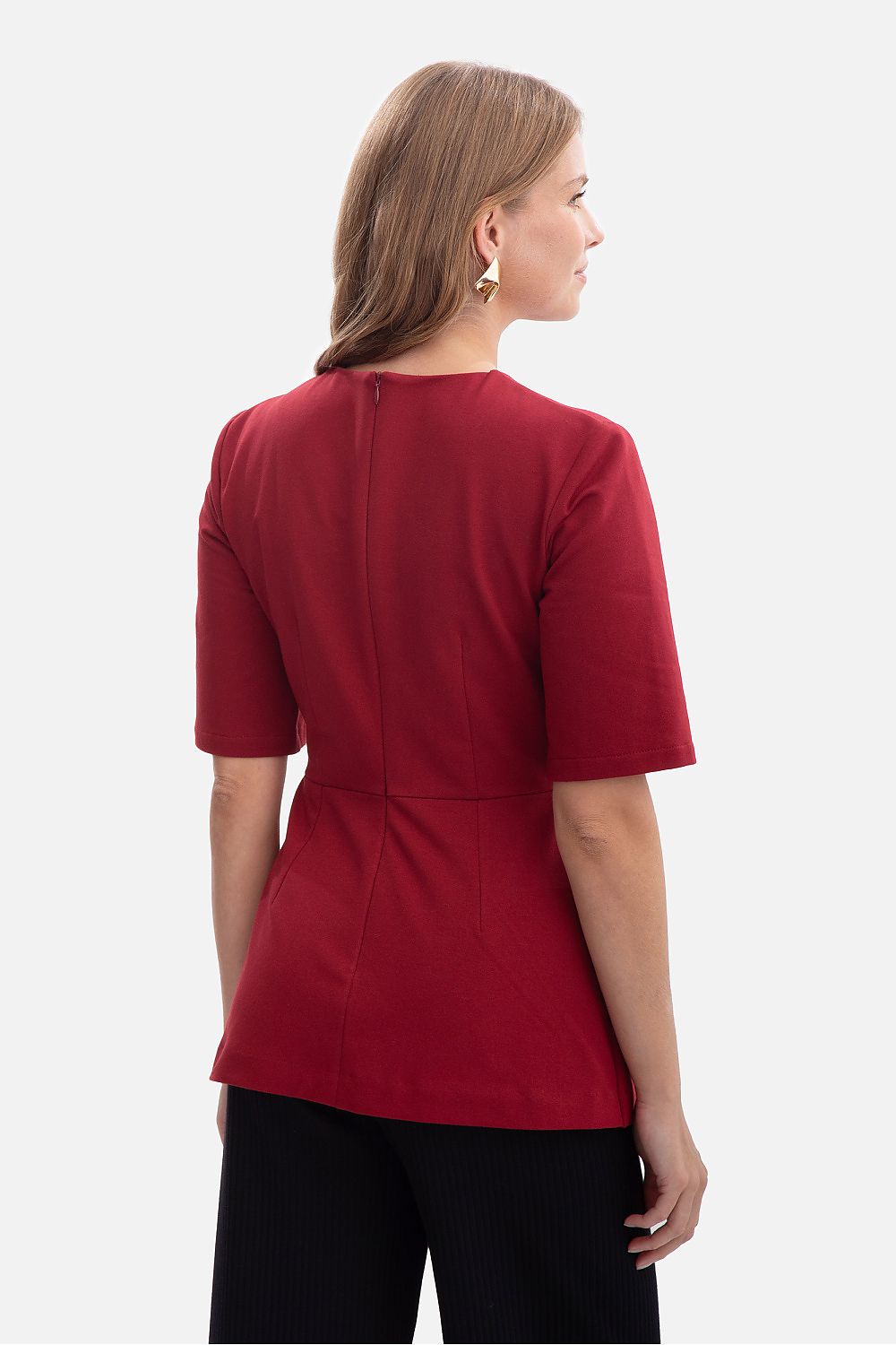 Front view of the stylish BeWear blouse with elbow-length sleeves and a classic round neckline, showcasing the exquisite quality and feminine silhouette.
