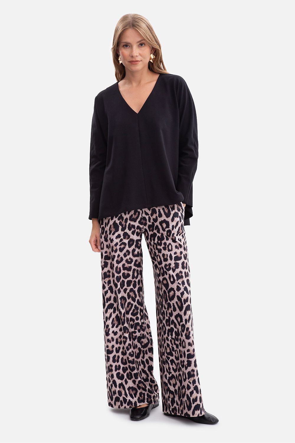 Fashionable BeWear Women's Blouse with straight long sleeves, captured in an elegant setting to emphasize its versatility and timeless appeal.