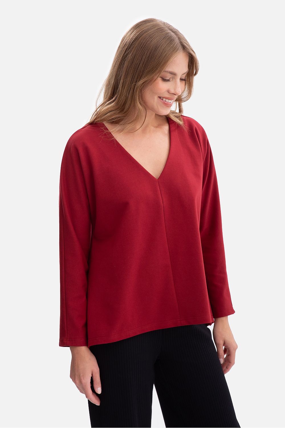 Chic and contemporary BeWear women's oversized blouse in a soft cotton blend, designed for comfort and versatility, perfect for pairing with trousers or leggings.