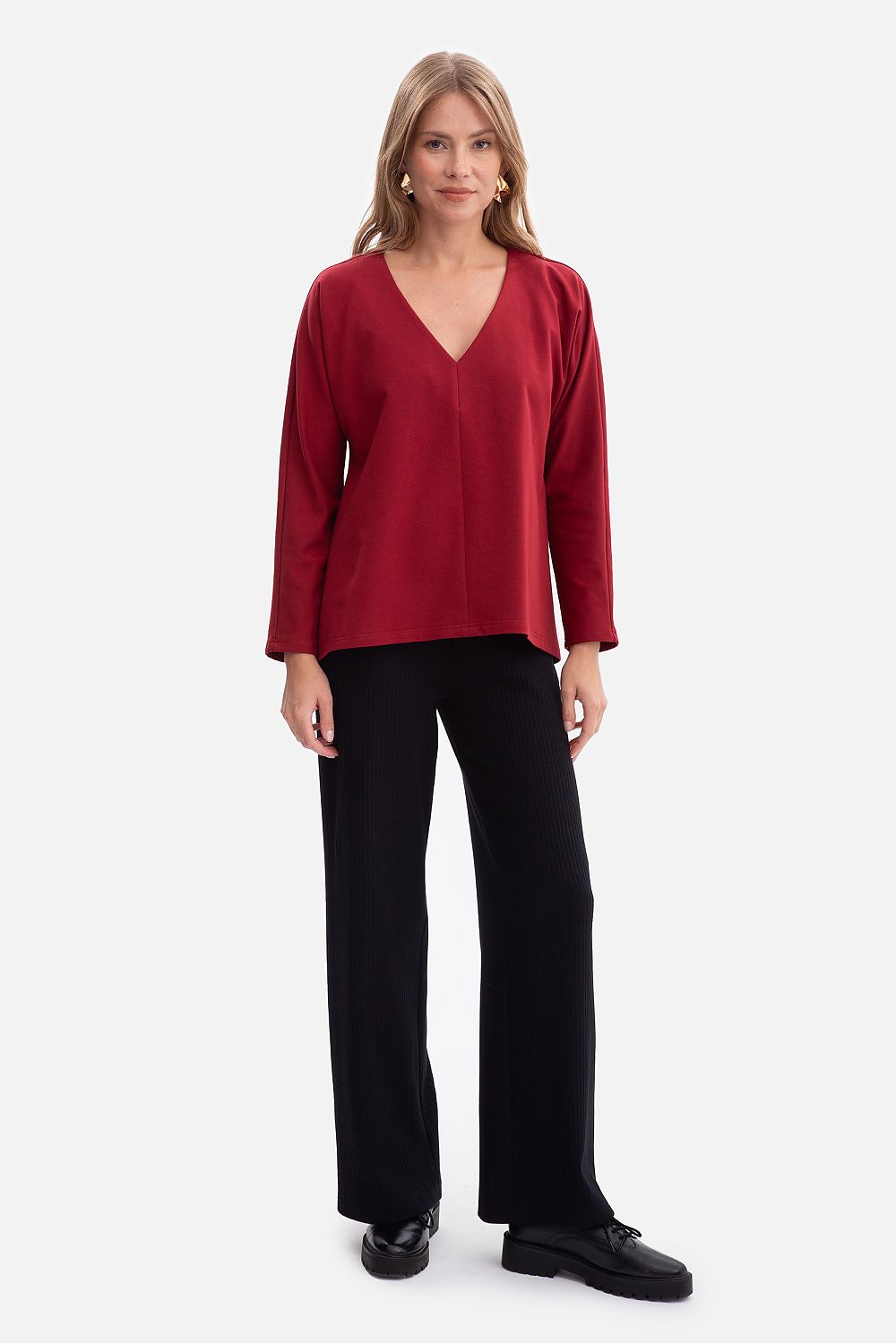 Luxurious BeWear women's V-neck blouse, featuring breathability and a modern cut, crafted from premium soft cotton blend for effortless elegance.