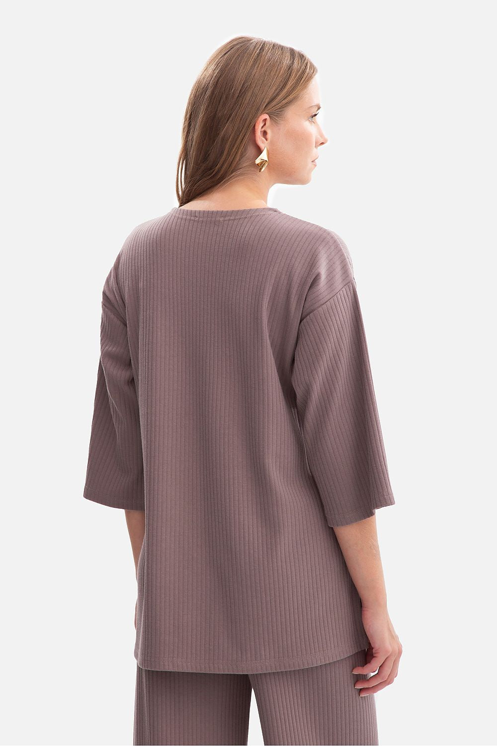 Elegant BeWear Women's blouse featuring 3/4 length sleeves and side slits, perfect for versatile dressing.