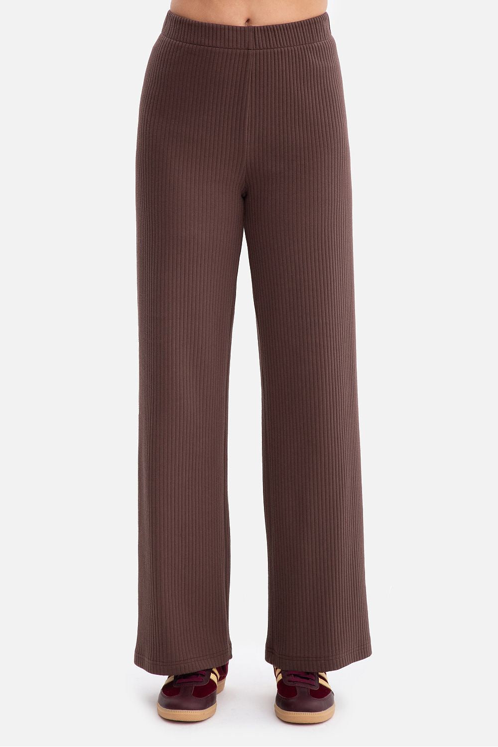 Elegant Women's Ribbed Trousers by BeWear with an elastic waistband and loose fit, showcasing the luxurious ribbed texture against a soft background.