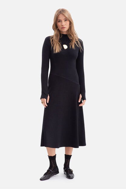 Elegant presentation of the BeWear Midi Daydress, showcasing the dress’s beautiful movement and luxurious style.