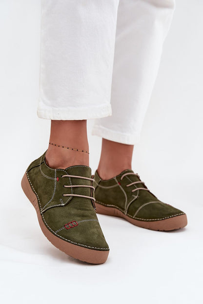 Elegant women's natural leather half shoes by Step In Style, showcasing a sophisticated design with subtle stitching, ideal for versatile styling from casual to formal occasions.
