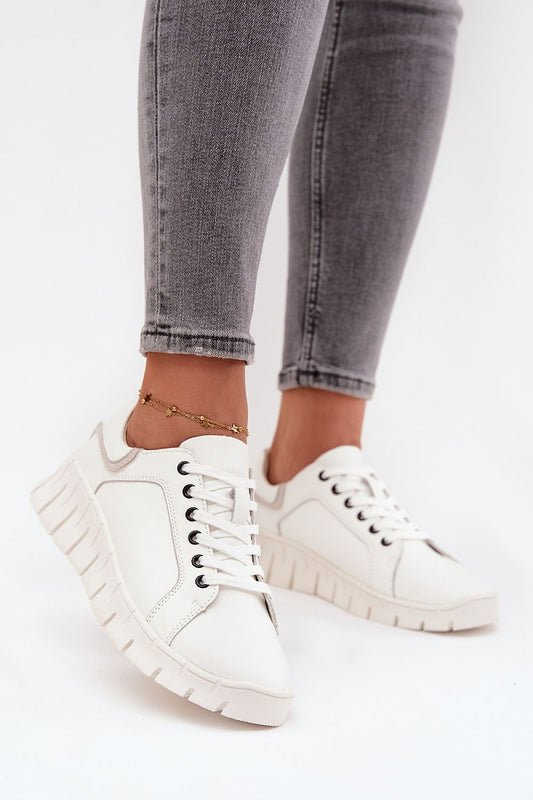 Step In Style Women's luxurious leather low shoes featuring a subtle wedge heel, perfect for casual urban looks. Available in EU sizes 36-40, these comfortable sneakers are designed by Step In Style, combining elegance with everyday practicality.