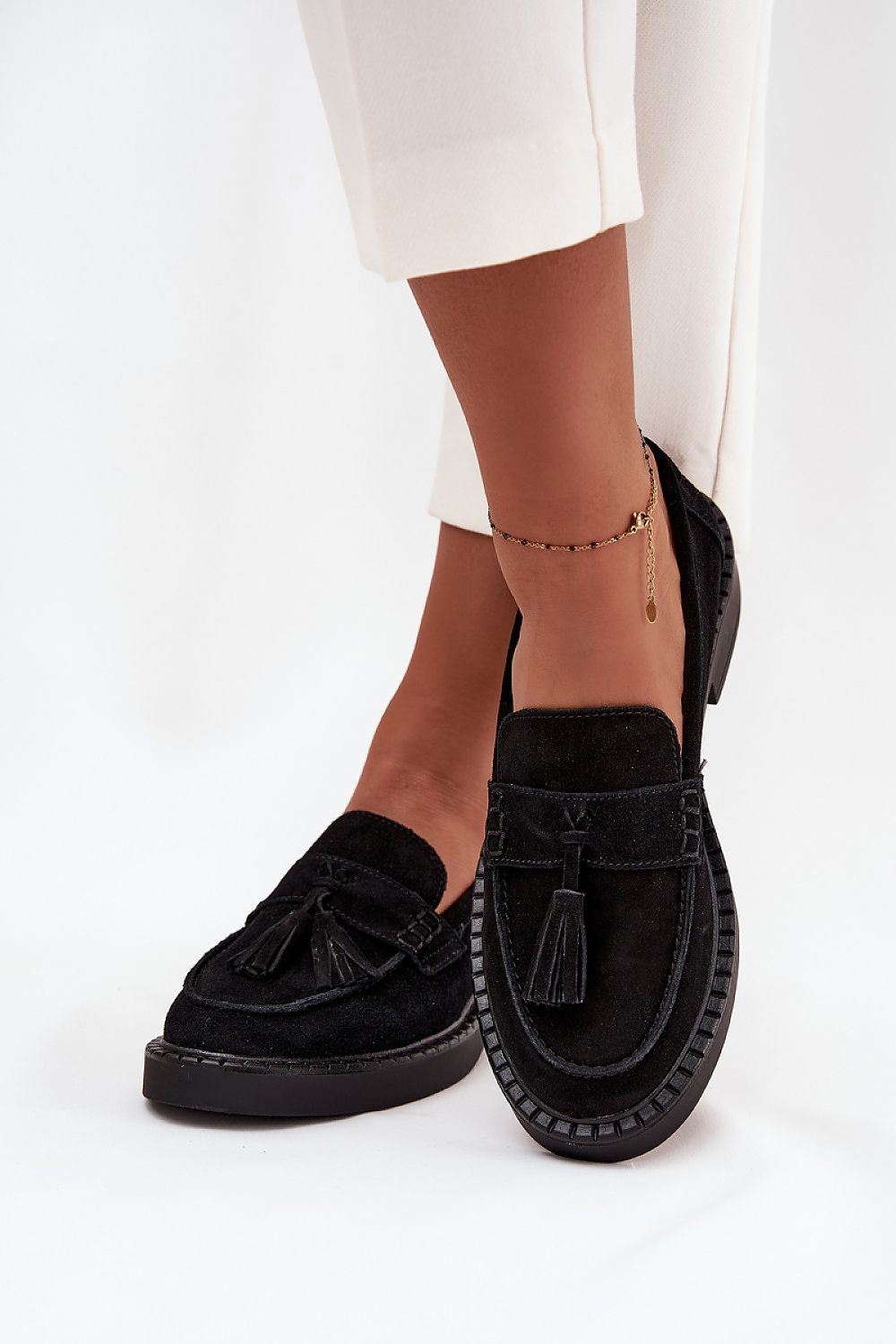 Stylish Step in Style moccasins for women, crafted from premium suede with a charming fringe detail, ideal for both casual and elegant looks.