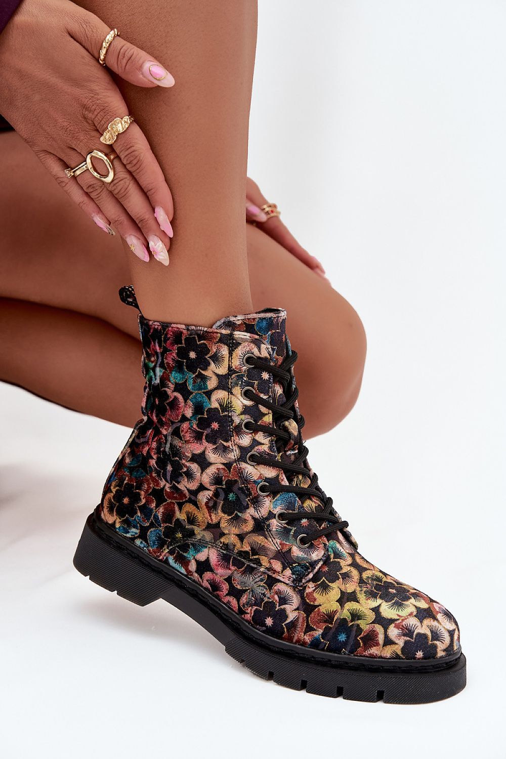 Artiker Women's Floral Ankle Boots by Step in Style featuring a flat heel and side zipper, designed for both comfort and sophisticated appeal.