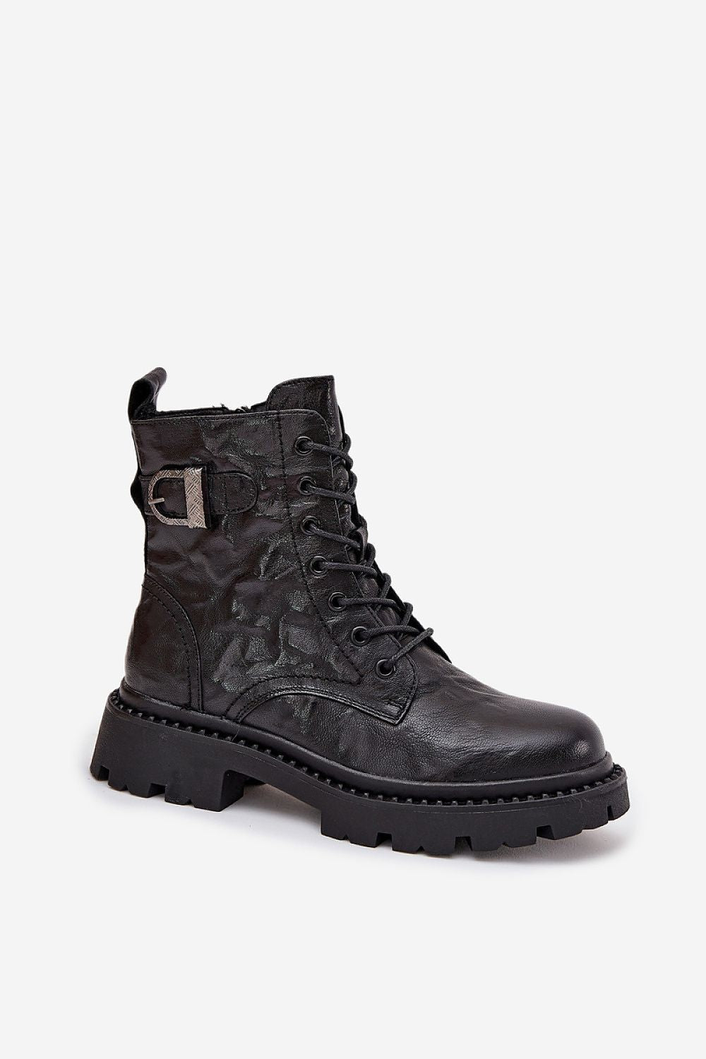 Elegant women's ankle boots with 4 cm heels, designed by Step in Style, showcasing a refined natural leather finish and practical zip fastening for comfort.