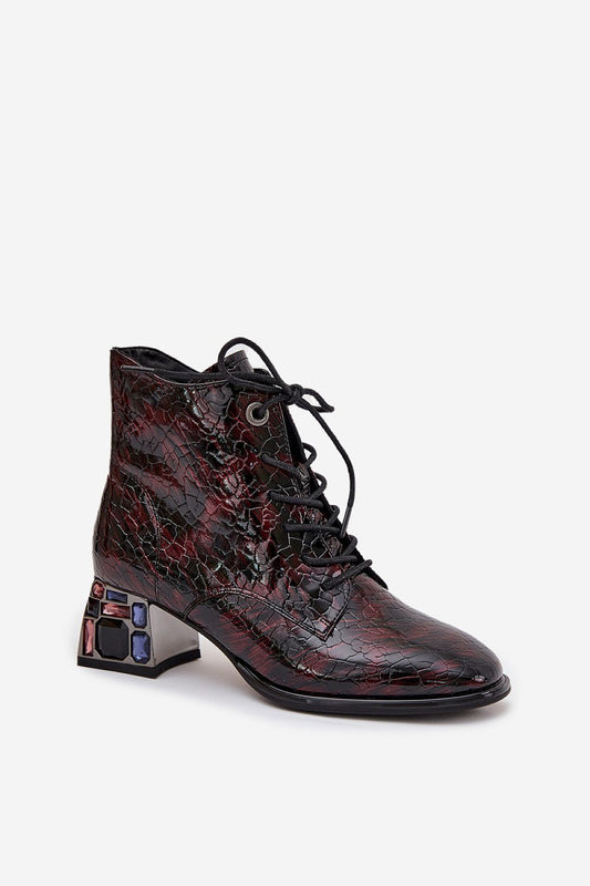 Close-up of Step in Style Women's Patent Leather Heel Boots embellished with crystals, showcasing the intricate detailing and premium quality craftsmanship.