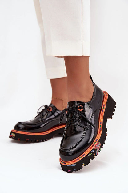 Stylish and comfortable women's patent leather shoes by Step in Style, designed with rounded toes and an elegant silhouette for any occasion.