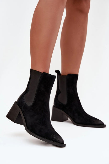 Close-up of the luxurious suede texture of women's ankle boots by Step in style, highlighting the sophisticated craftsmanship and design for elegance and comfort.