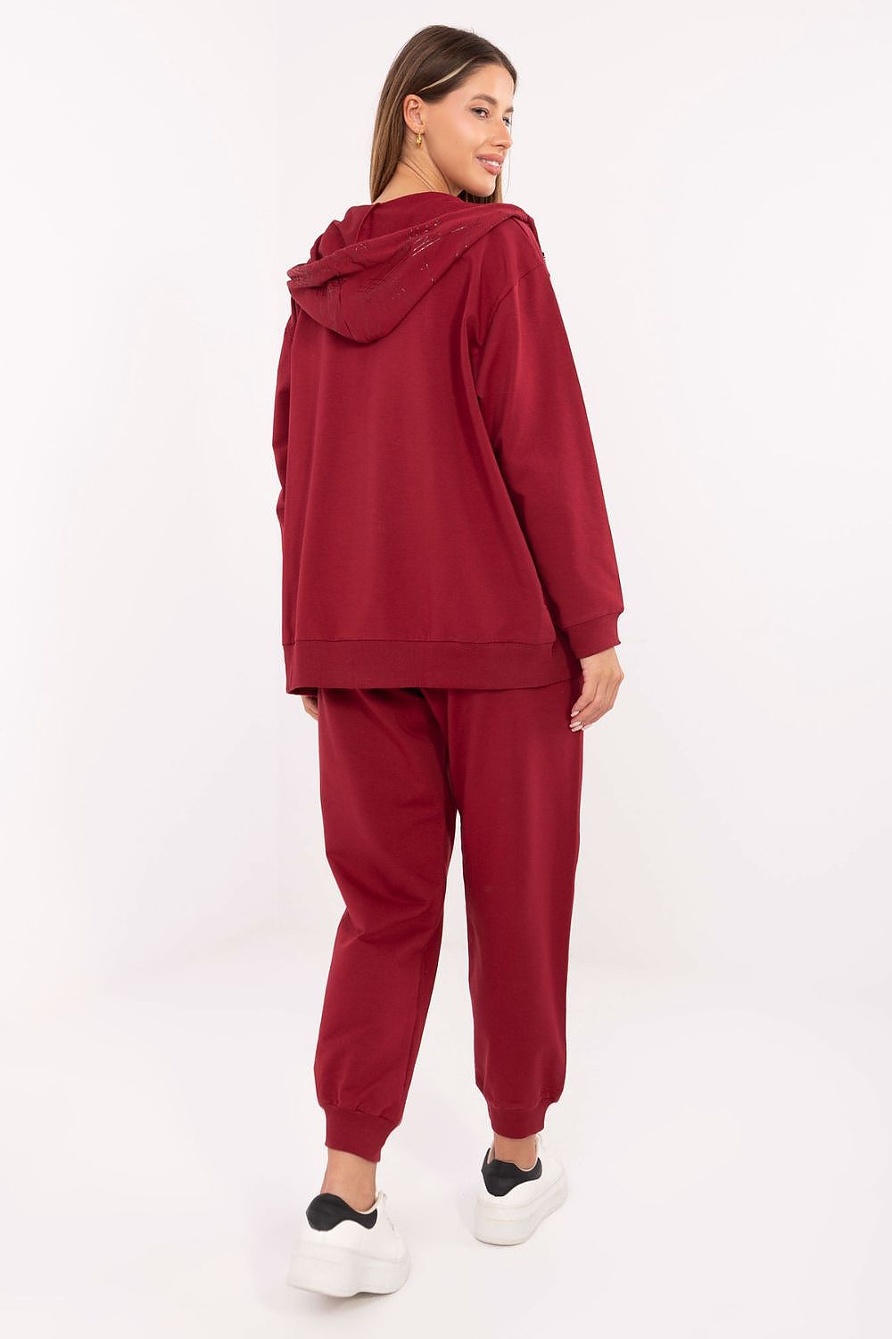 Fashionable women's zip-up hoodie and high waist pants tracksuit set from Relevance, perfect for everyday luxury wear.