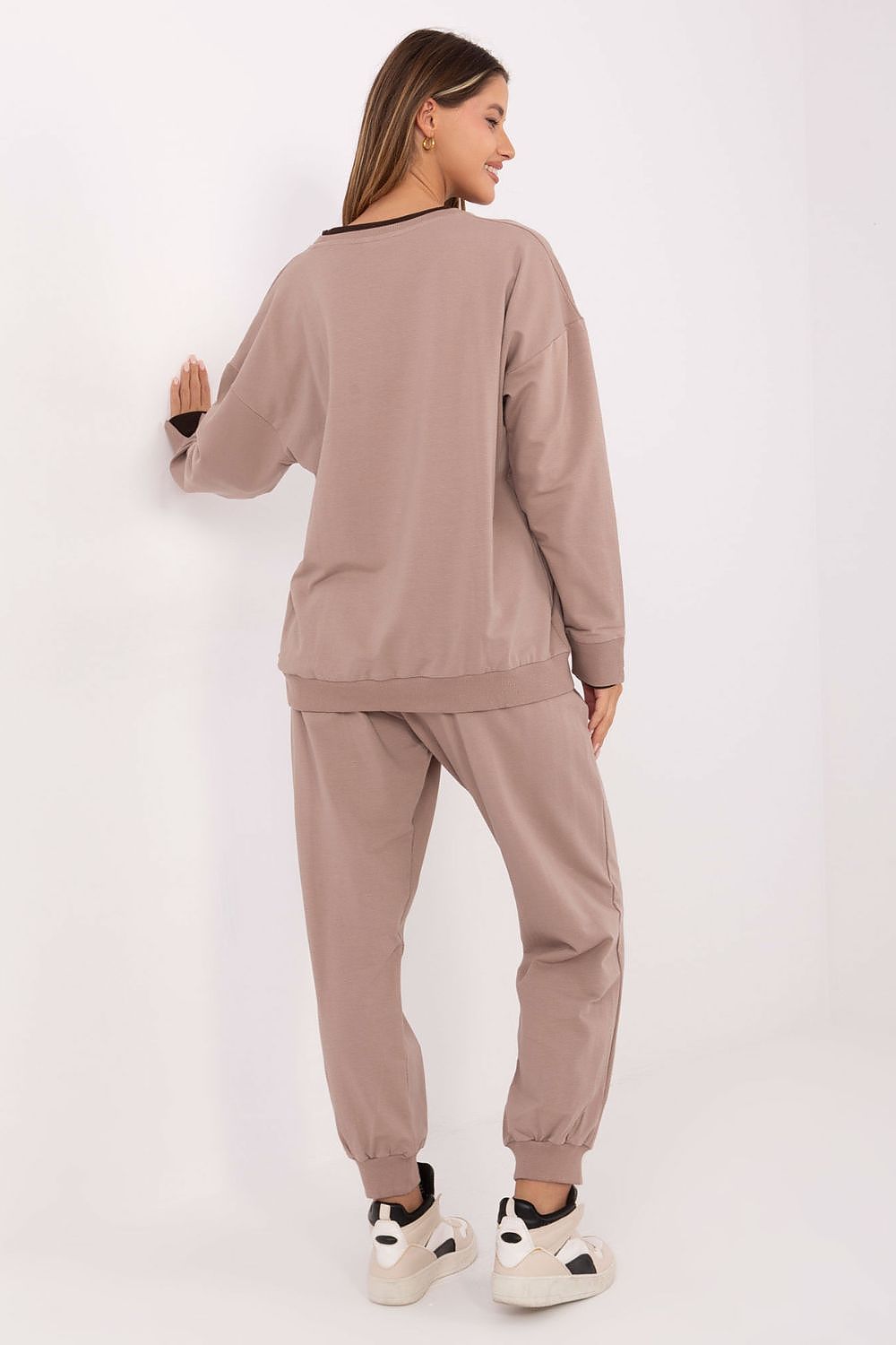 Detailed view of the premium fabric of Relevance women's tracksuit, featuring 90% cotton and 10% spandex for ultimate softness.