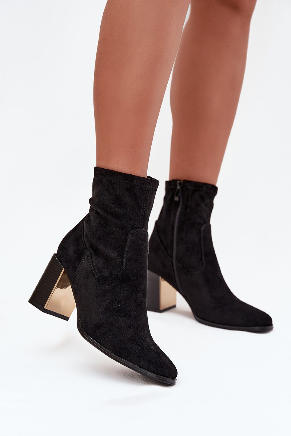 Elegant women's eco suede ankle boots with gold detailing from Step in Style, featuring a warm insulated interior and a stylish zipper closure.