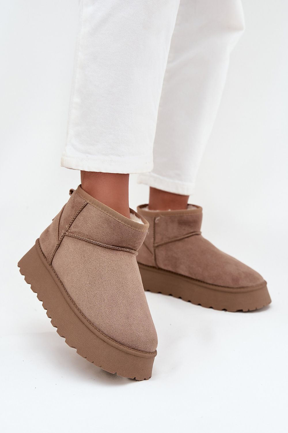 Luxury women’s eco suede snow boots with fur lining by Step in Style, designed for comfort and warmth, perfect for winter styling.