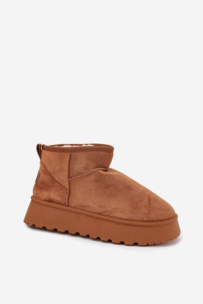 Deluxe women's snow boots from Step in Style, crafted in eco suede with warm fur lining, combining luxury and functionality for cold weather.