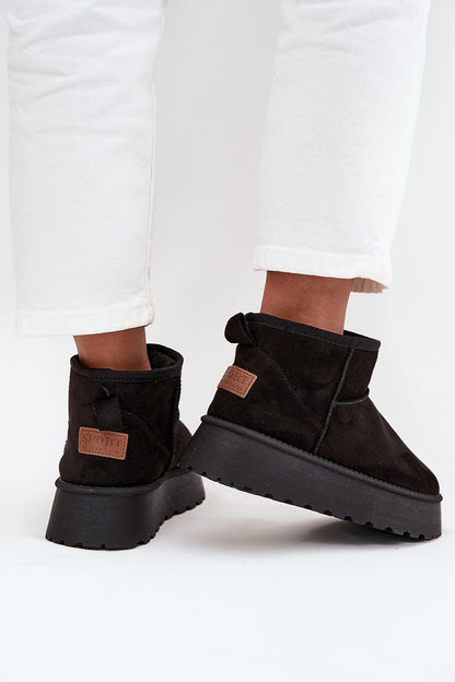 Insulated women's snow boots displaying a beautiful eco suede finish and luxurious fur lining, available from Step in Style.