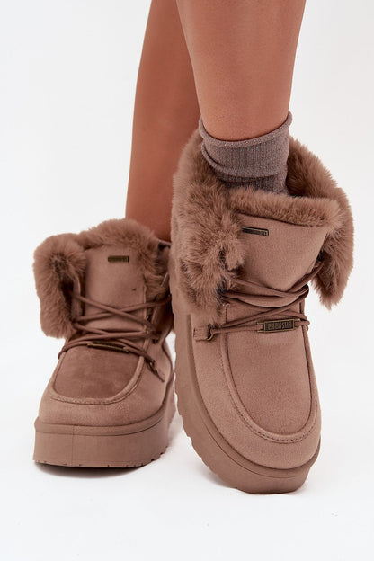 Luxurious women's waterproof snow boots by Step in Style, featuring plush fur lining and elegant platform design, perfect for winter elegance.