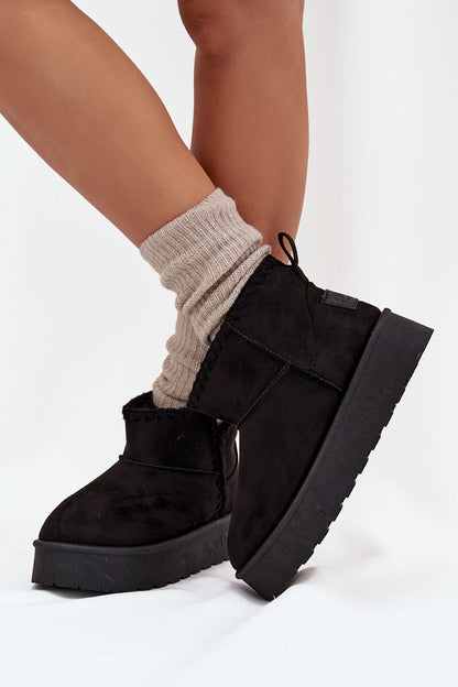 Close-up view of Step in Style women’s snow boots showcasing the high-quality eco suede material and plush fur lining ideal for winter comfort.
